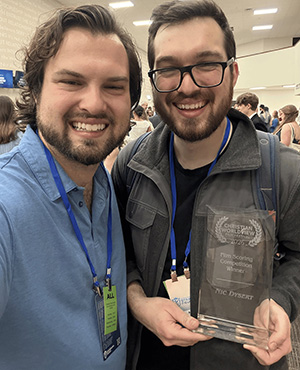 Nic Dysert recieves award.