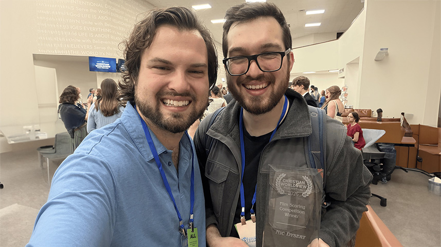 Nic Dysert recieves award.