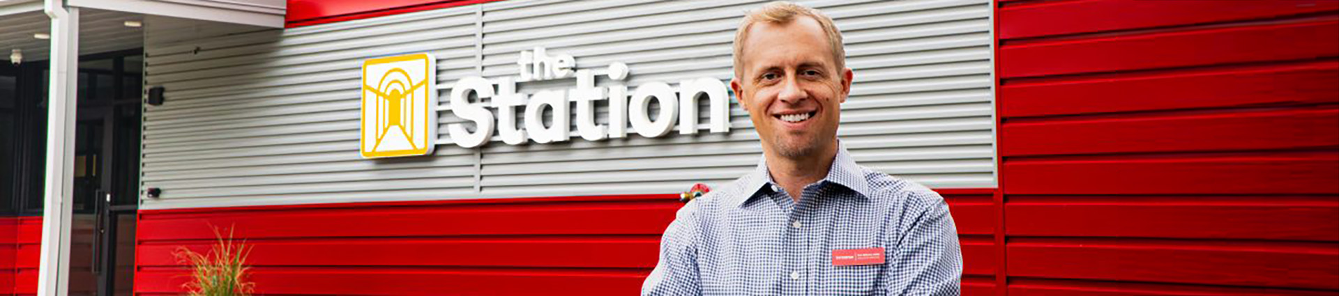 Eric Gilmore stands in front of The Station, the residential portion of Immerse Arkansas.