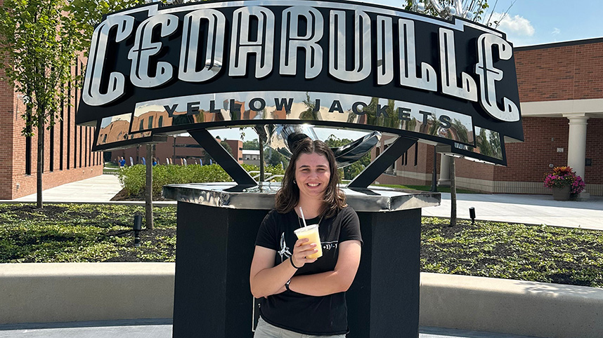 Grace Maxwell at the Stinger statue.