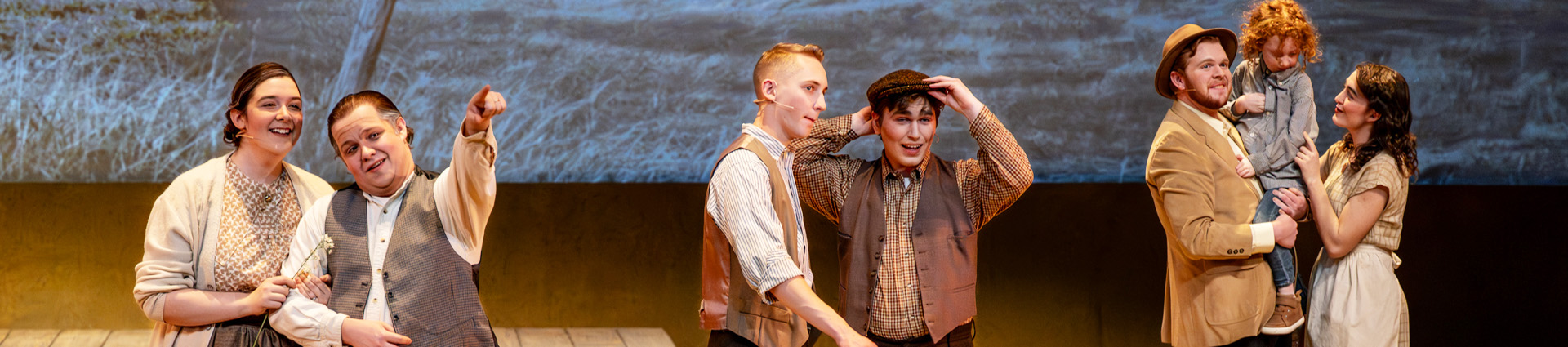 Actors and actresses dressed in 1930s costumes sing during the musical "Horizons of Gold."