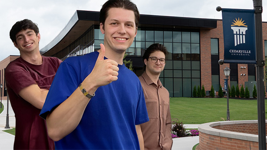 Josh Hochstedler, Will Woods and Aaron Perry in from of the Scharnberg Business and Communication Center.