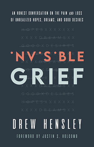 Invisible Grief book cover, black with orange and white lettering.