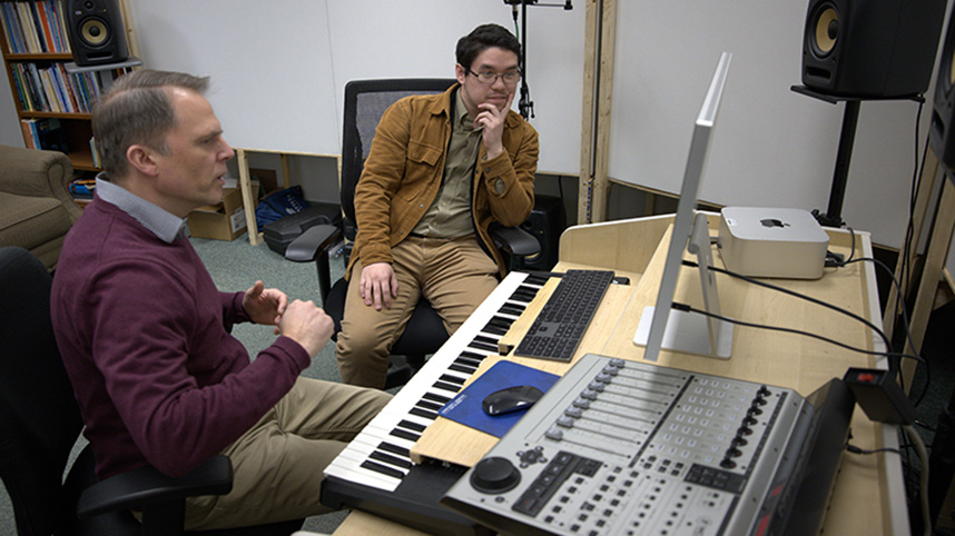 Professor Jaquith teaches a student in his newly remodeled music studio.