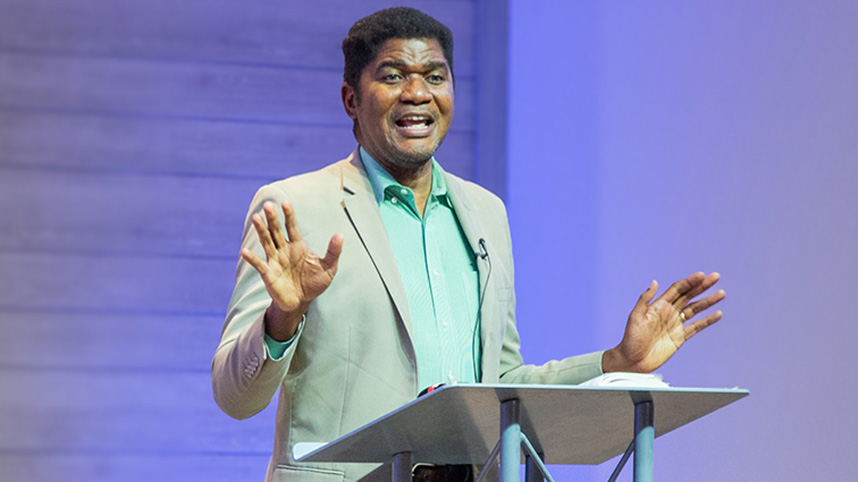 Dr. Lou Lilite leads worship.