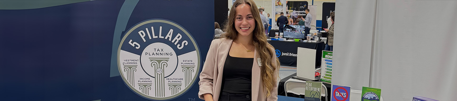 Haley Mast at the Peak Retirment Planning table during Cedarville University's career fair.