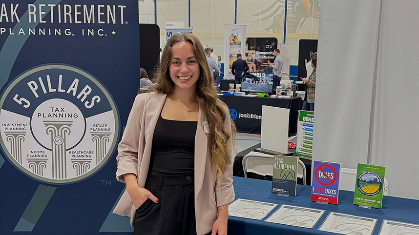 Haley Mast at the Peak Retirment Planning table during Cedarville University's career fair.