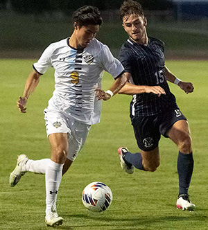Men playing soccer at Cedarville University.