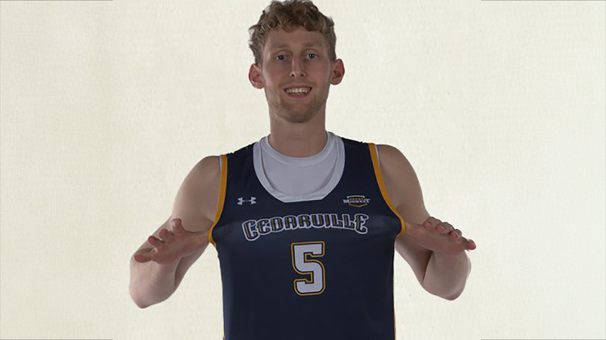 Ondrej Plasil in Cedarville University basketball jersey.