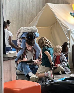 A Cedarville student enjoys playing with the elementary-aged students at the Ark of H.O.P.E.