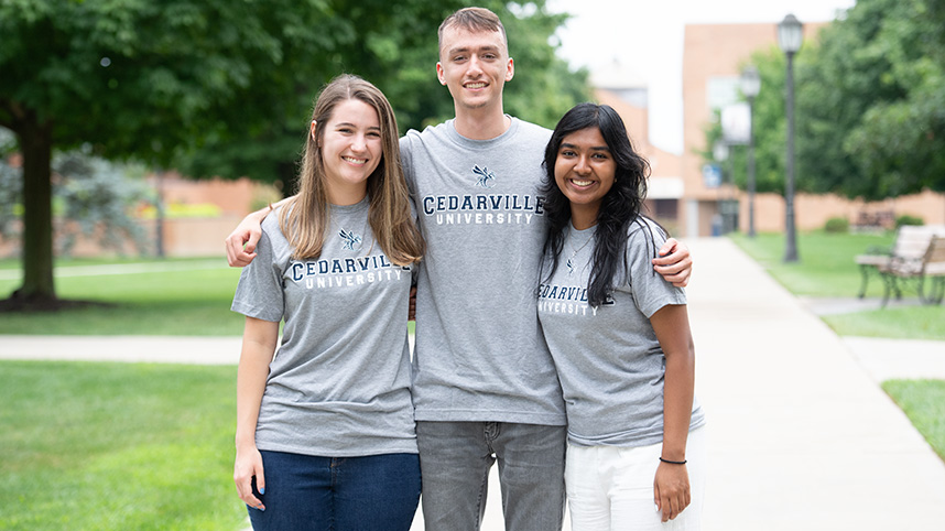 Three students in Cedarville t-shirts.