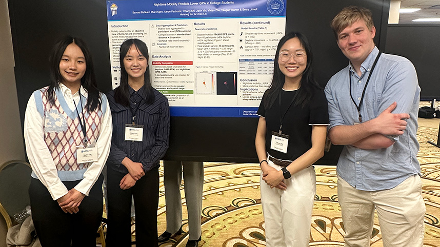 Doreen Yin, Phoebe Zhu, Grace Shi, Samuel Babbert with their sleep study poster.
