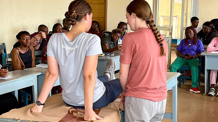 Two female Cedarville University athletic training graduates conduct a training in Cameroon.