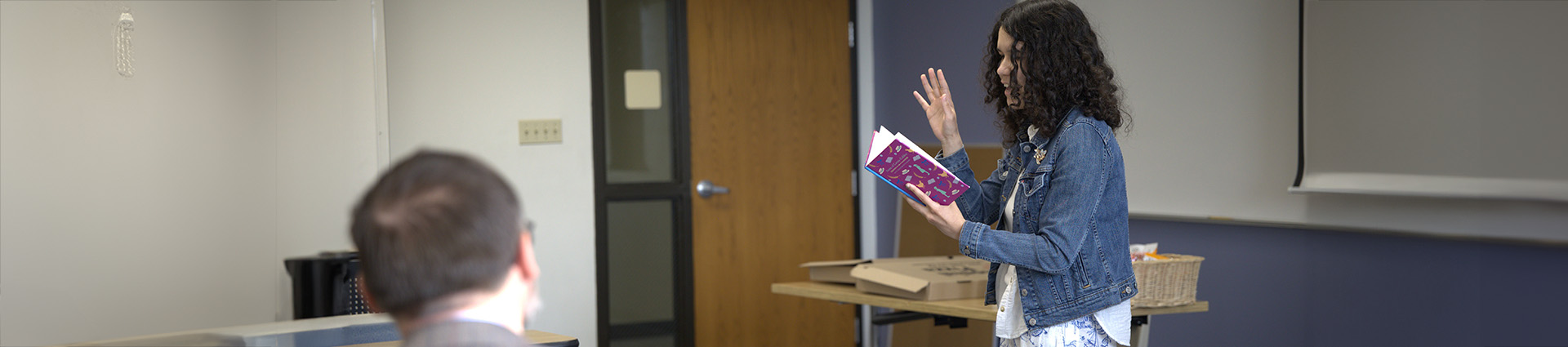 Student reading poetry.