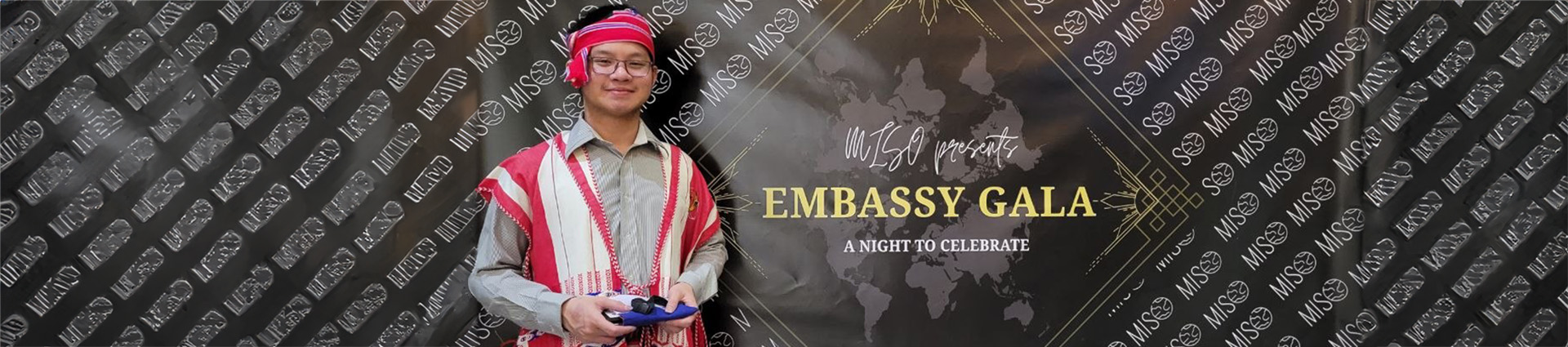 Thurein Zan dressed in traditional Karen clothing from his home country of Myanmar.
