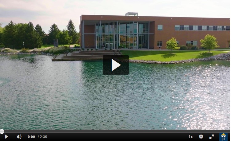Video screen shot of Center of Biblical and Theological Studies overlooking Cedar Lake
