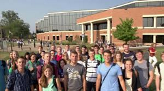 Large group of college students posing outside for picture