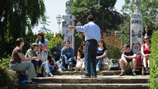 A professor instructs a class at a study abroad location