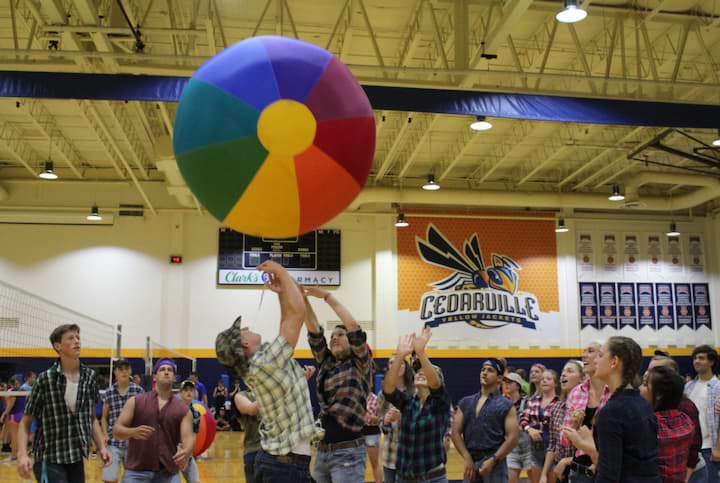 Students play Beach Ball volleyball