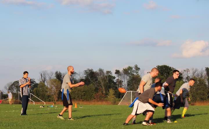 Students play a game of intramural football