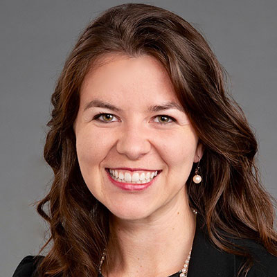 Danielle Baker smiling in a professional headshot