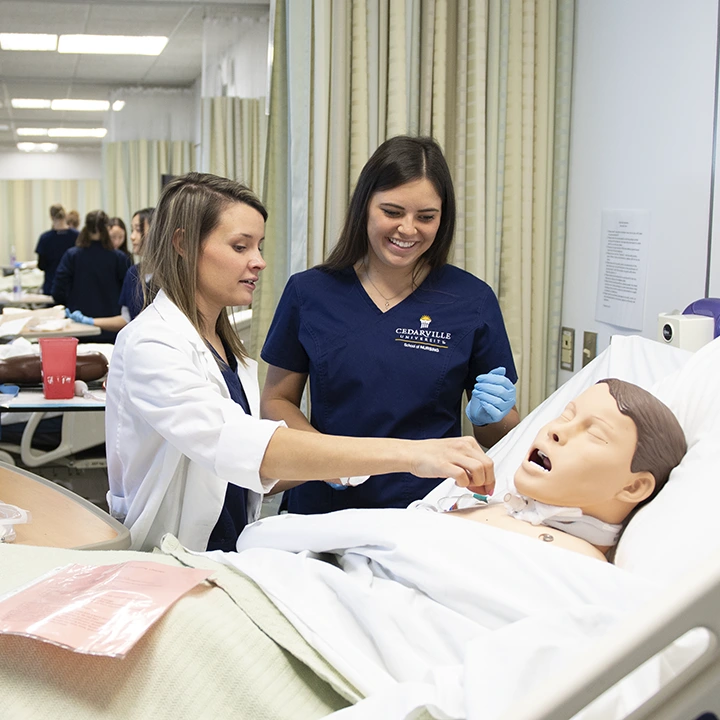 Nursing students practicing in the Sim Lab.