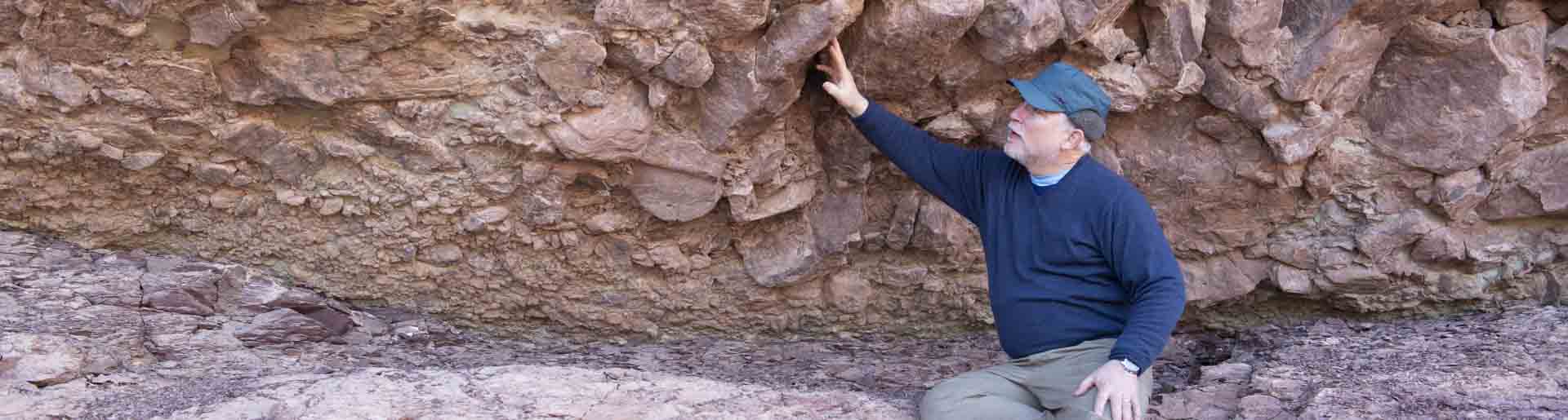 Dr. Whitmore at the Grand Canyon examining rocks.